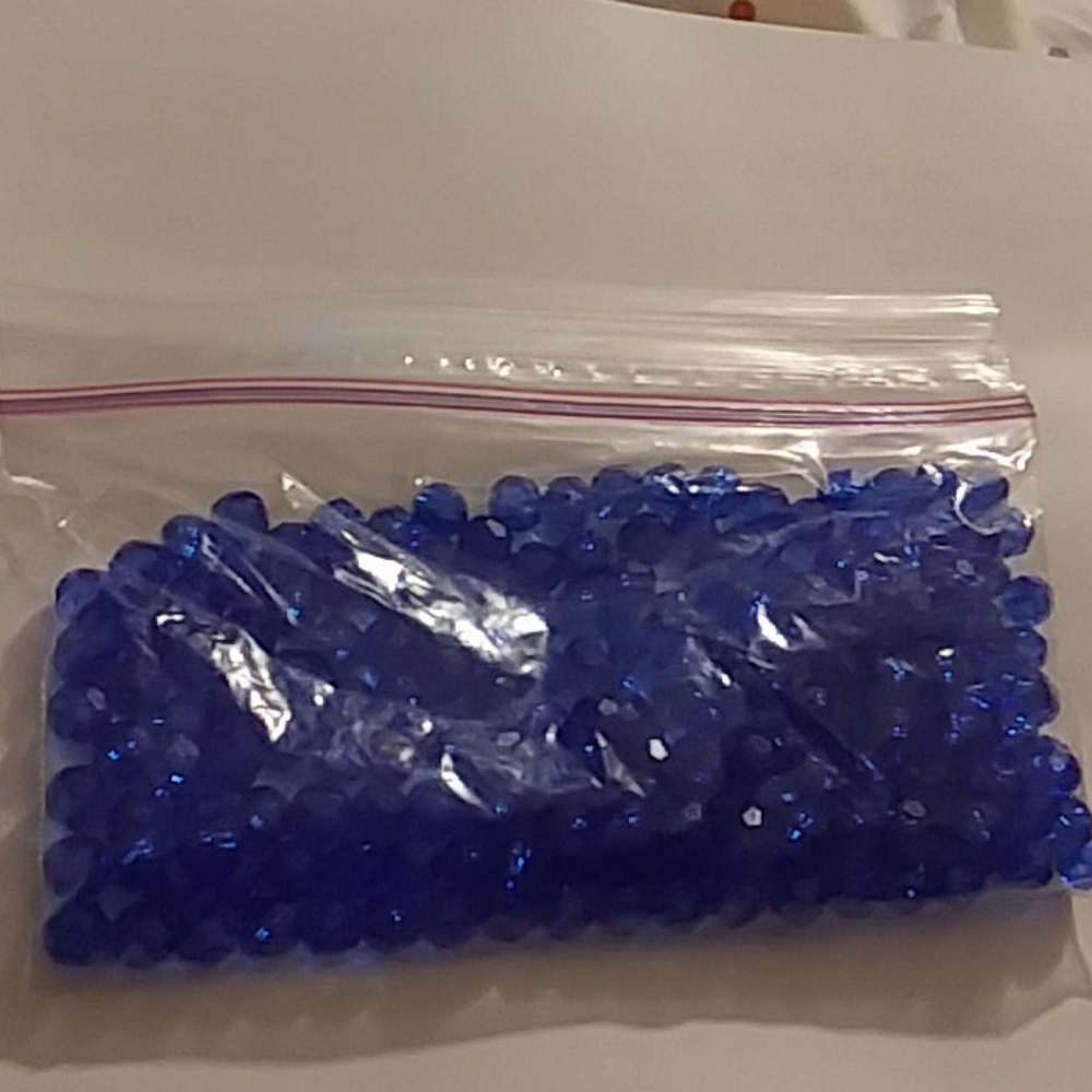 Bag of blue beads